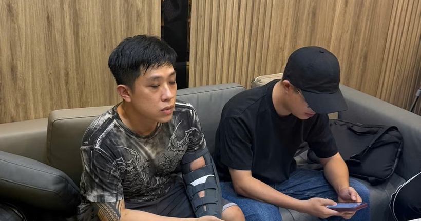 Đối tượng Vũ Quang Huy (ảnh trái, Ảnh: X.M.).