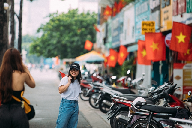Có một TP.HCM đẹp yên bình dưới sắc cờ rực rỡ ngày Tết Độc Lập- Ảnh 29. Có một TP.HCM đẹp yên bình dưới sắc cờ rực rỡ ngày Tết Độc Lập- Ảnh 29.