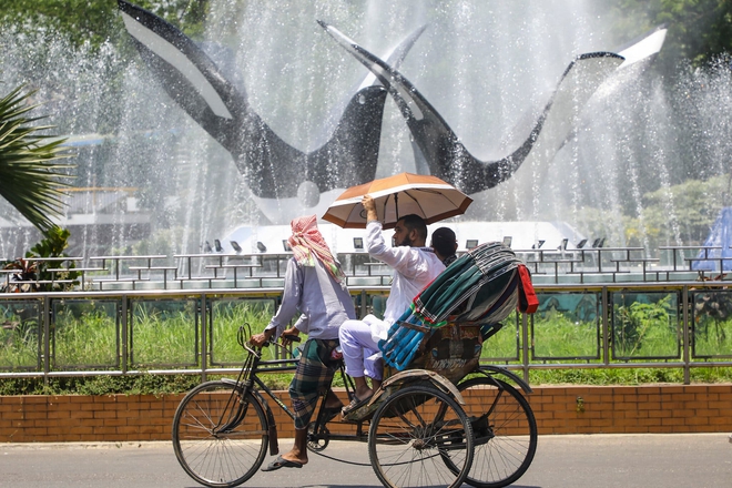 Chùm ảnh: Nắng nóng lịch sử tại hàng loạt quốc gia Đông Nam Á khiến người dân không thể thở, vật vã chống chọi với sóng nhiệt chết người - Ảnh 5.