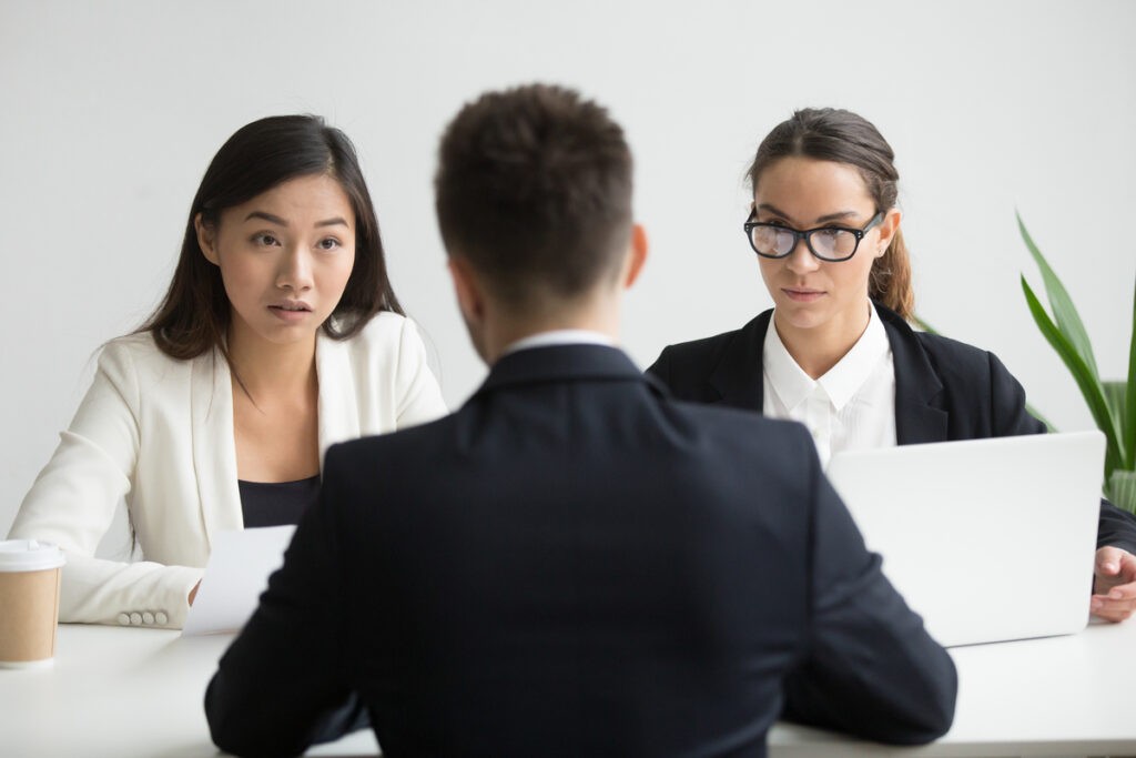 serious unconvinced diverse hr managers interviewing male job applicant 1024x683 1739934243509 1739934243716336571676