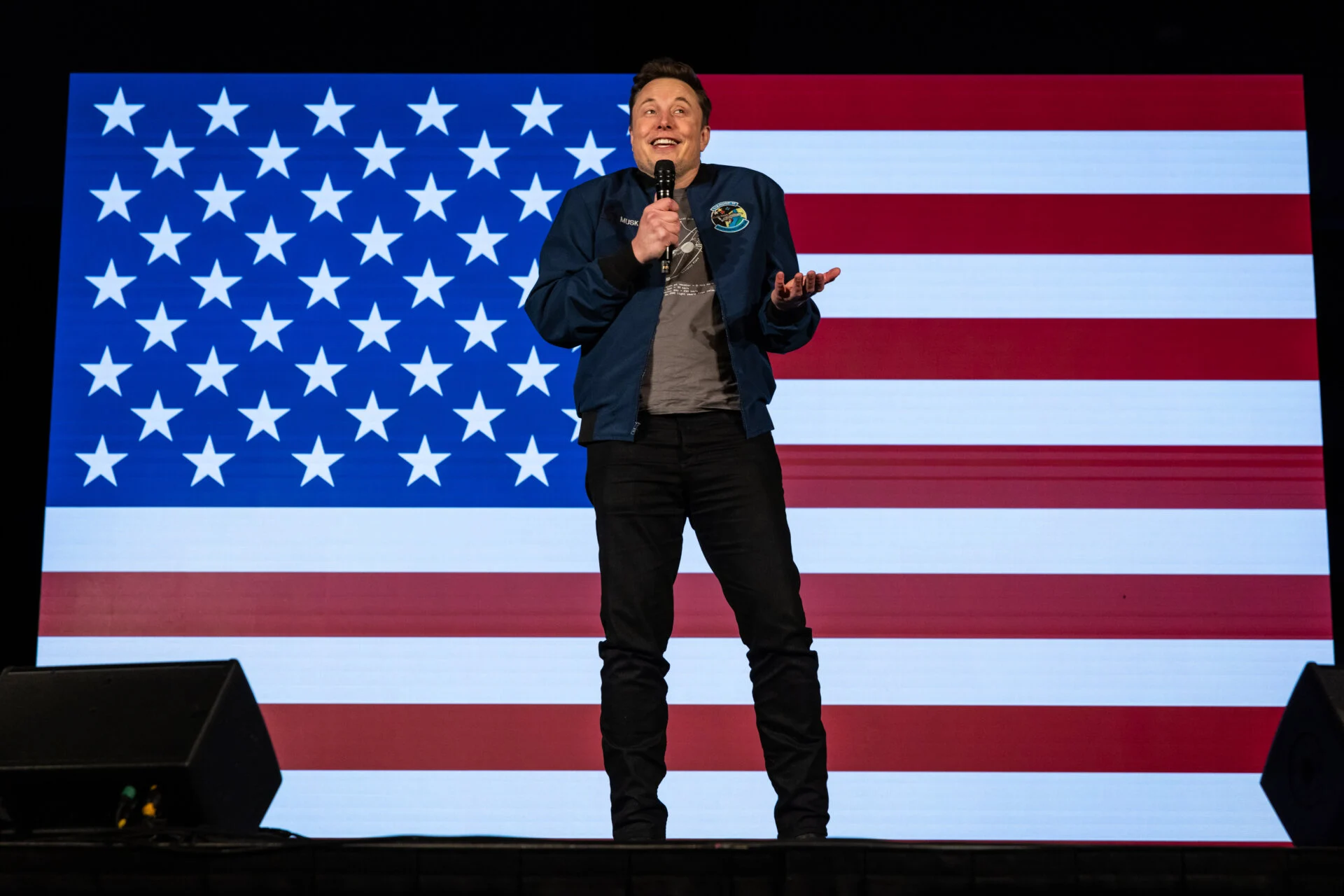 elon musk at a trump campaign event