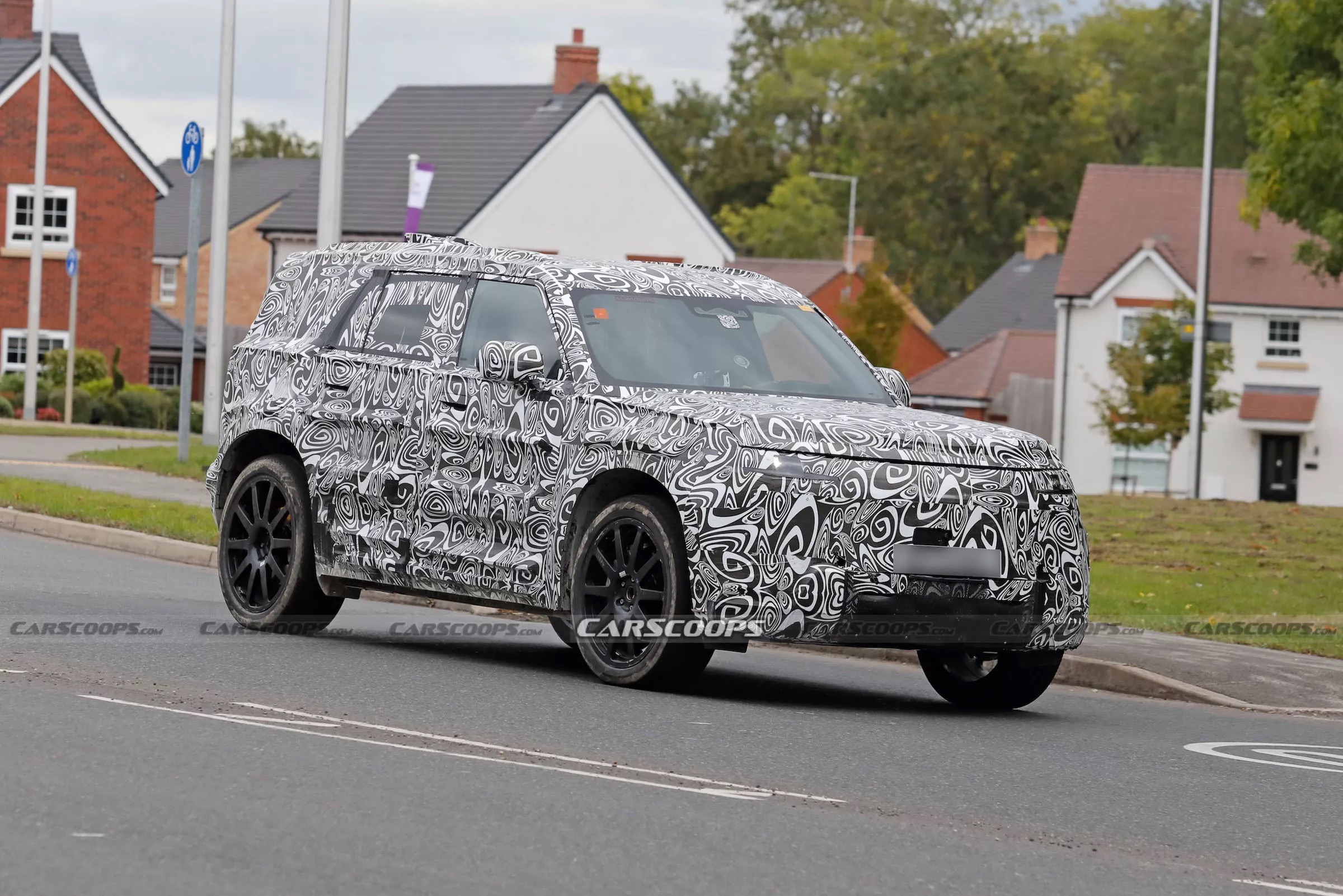 land rover defender sport ev spy shots 000081