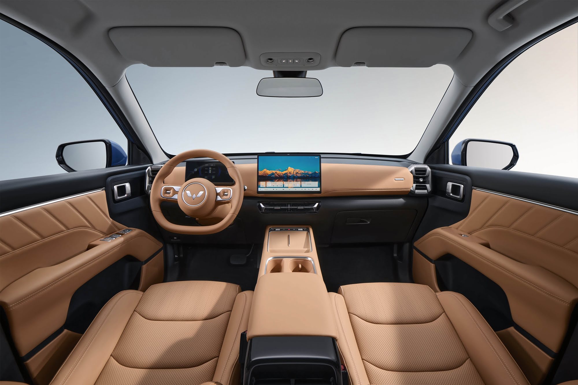 2026 wuling starlight 560 china press photos interior 001 cockpit dash steering wheel center stack infotainment screen front seats