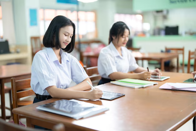 shorthaired asian female student with cute smile is student body president have knowledge be diligen