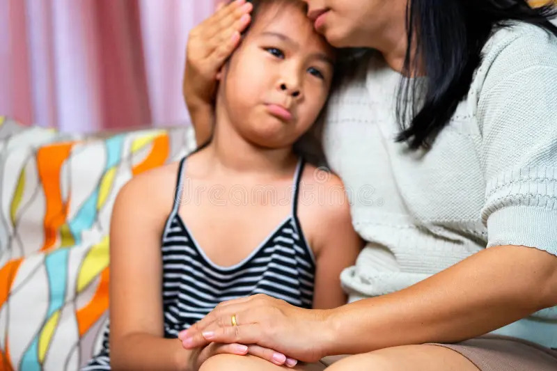 asian mother comforting her sad daughter home image expresses love care emotional support parent child 408690180