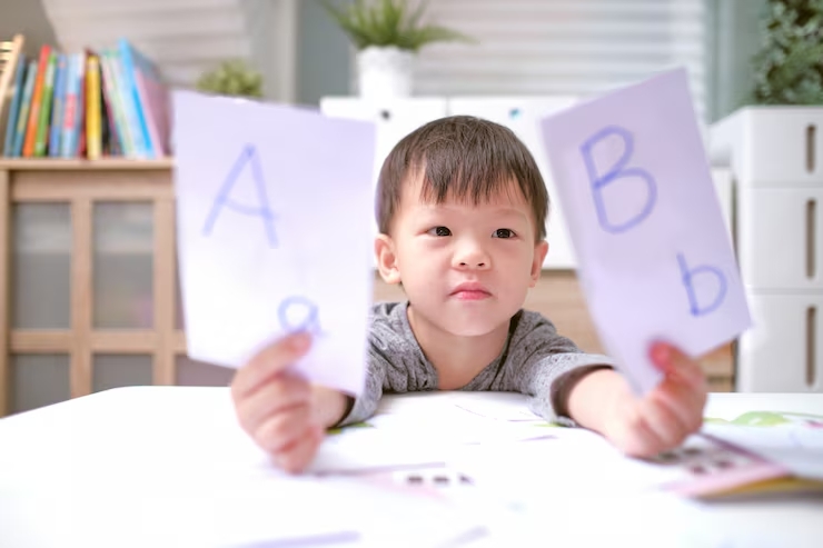 asian children learning english with flash cards teach young kids english home child home kindergart