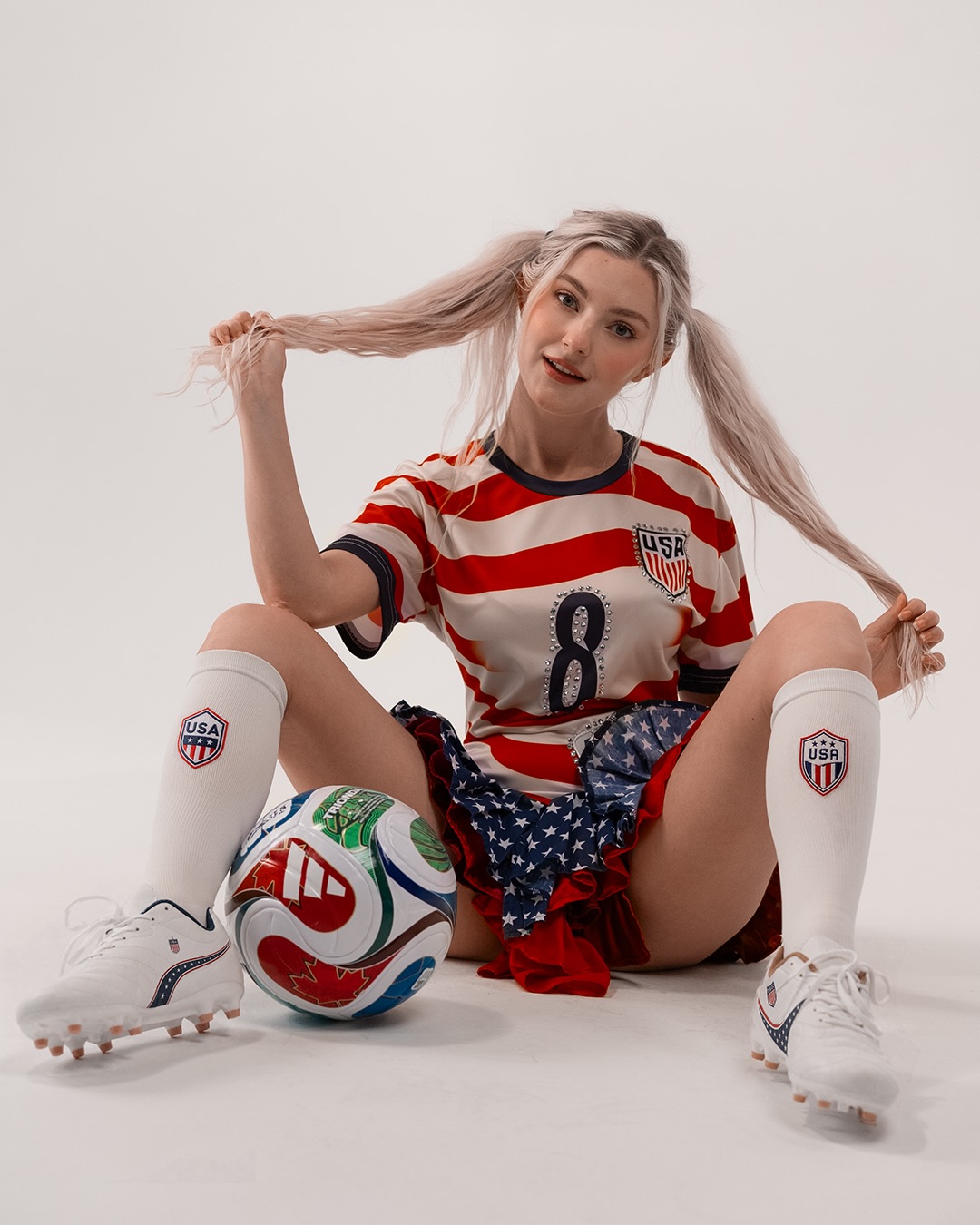 photo by eva elfie on july 01 2026 may be an image of american football football sportswear ball sport equipment and text