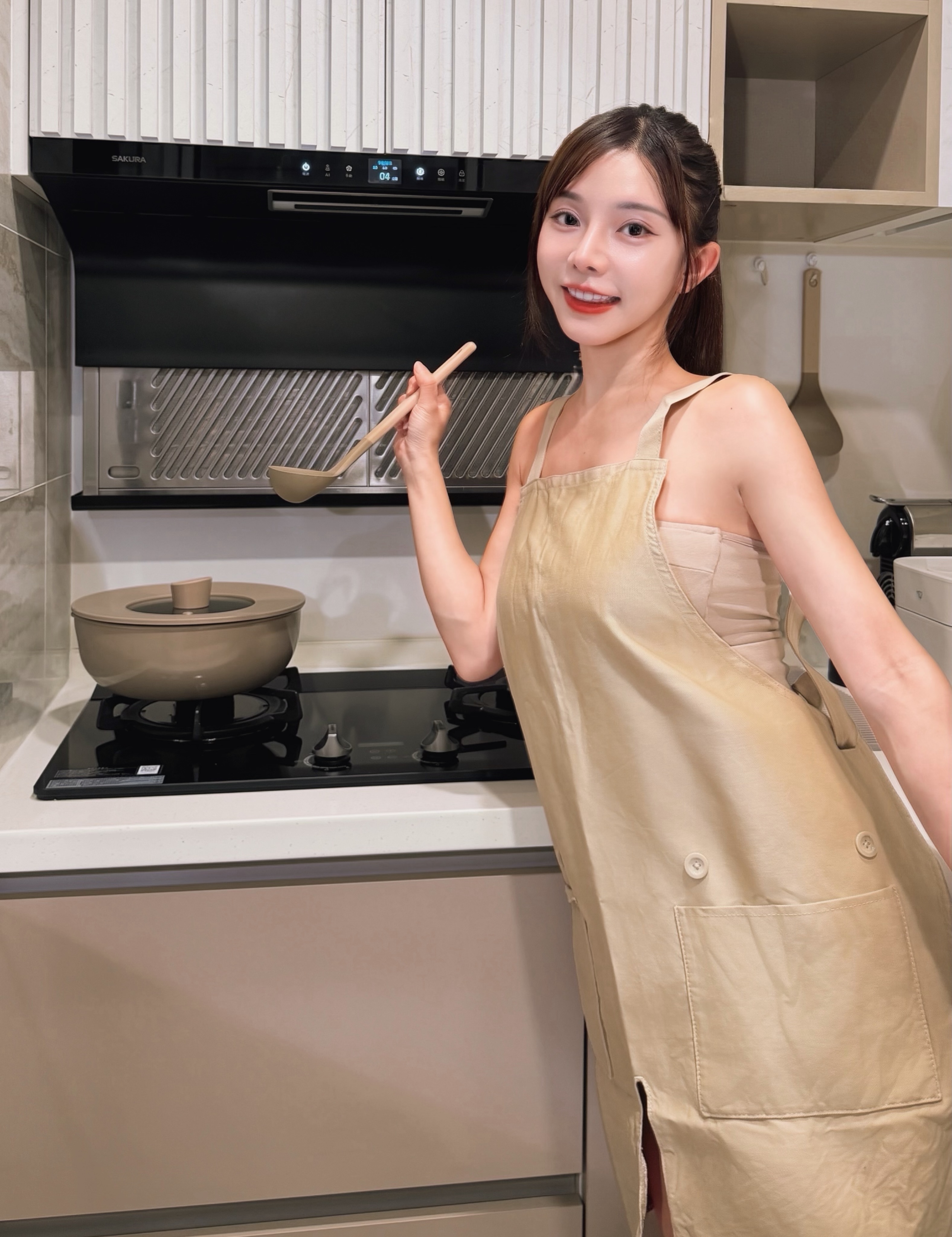 photo by on june 30 2026 may be an image of apron pot cooker and text