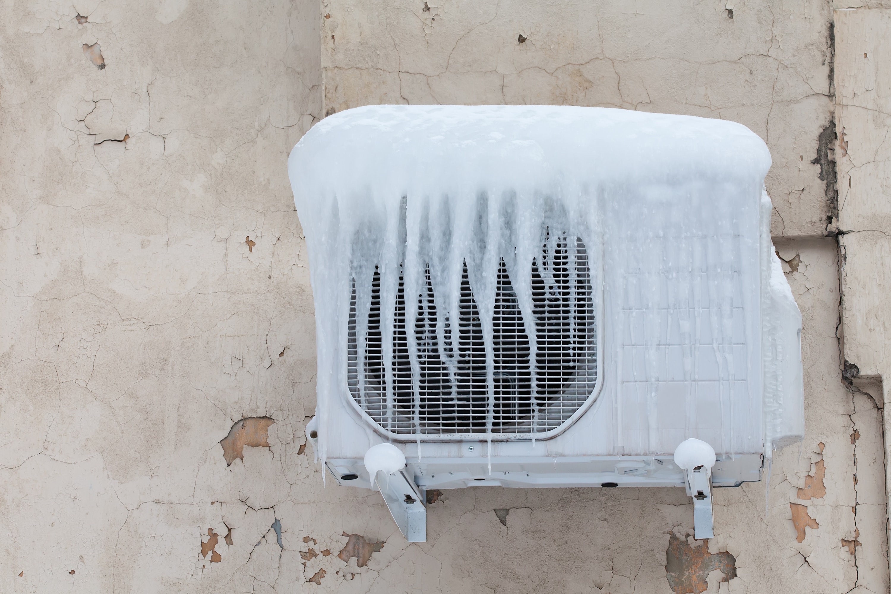 how to protect your hvac system from snow ice this winter