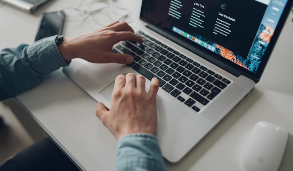 man using a laptop 1 1024x599