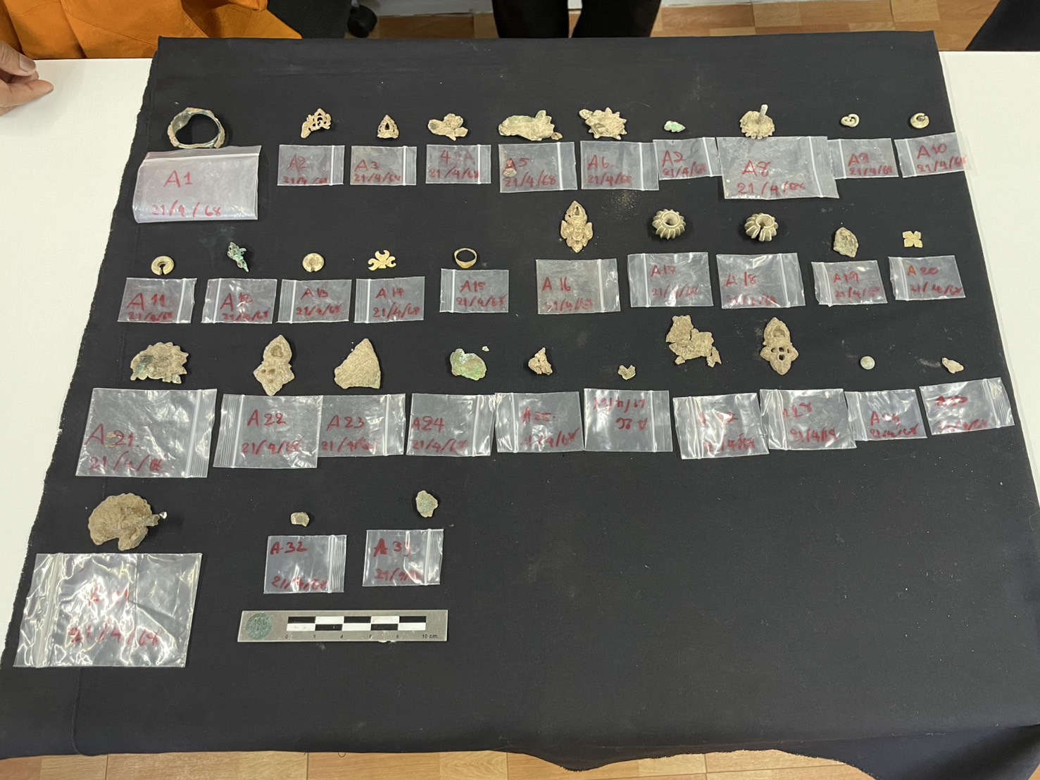 a collection of 33 metal ornaments 