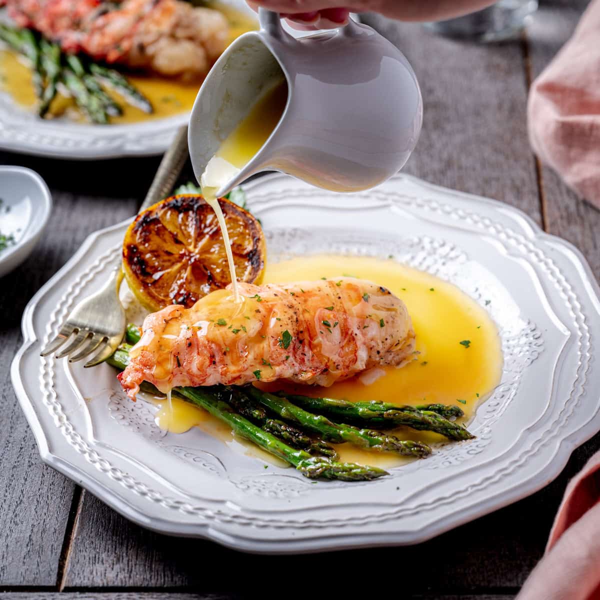garlic butter herb sous vide lobster with lemon beurre blanc featured 1 1745118721957339867207