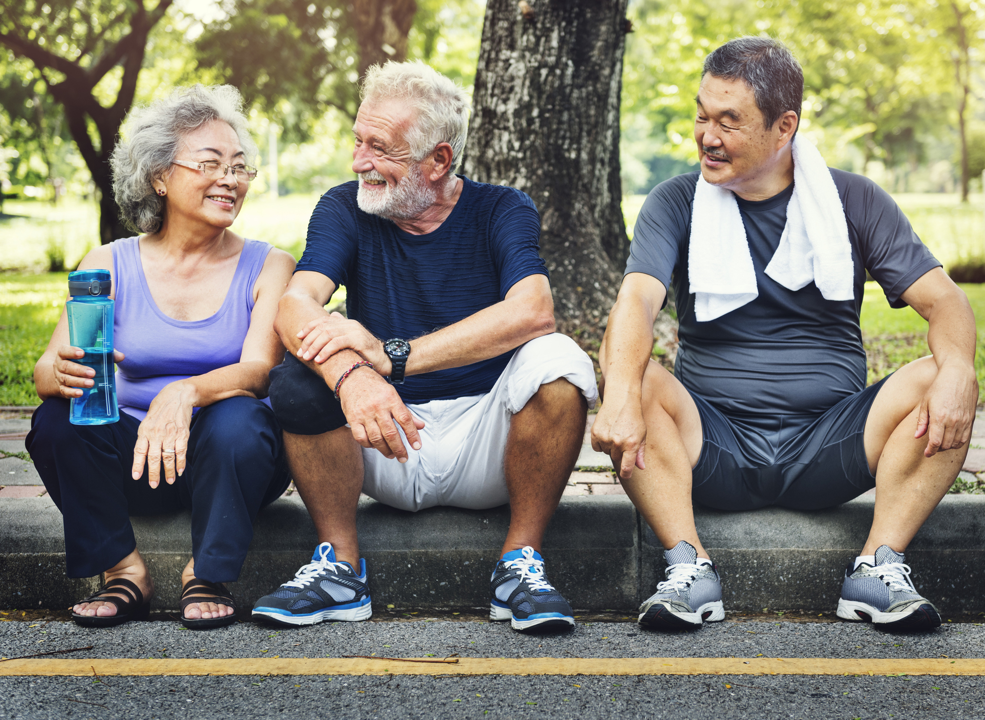 group seniors taking break from workout