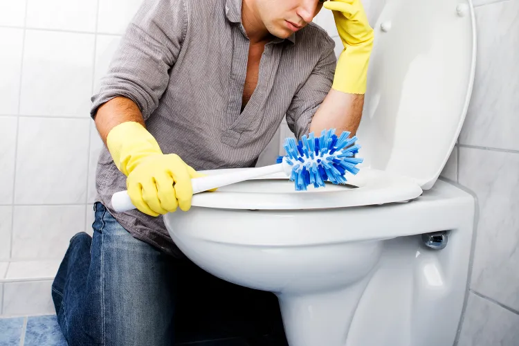 man cleaning toilet 071425 e51a2efc89dc49c3adaf2306b9915cec