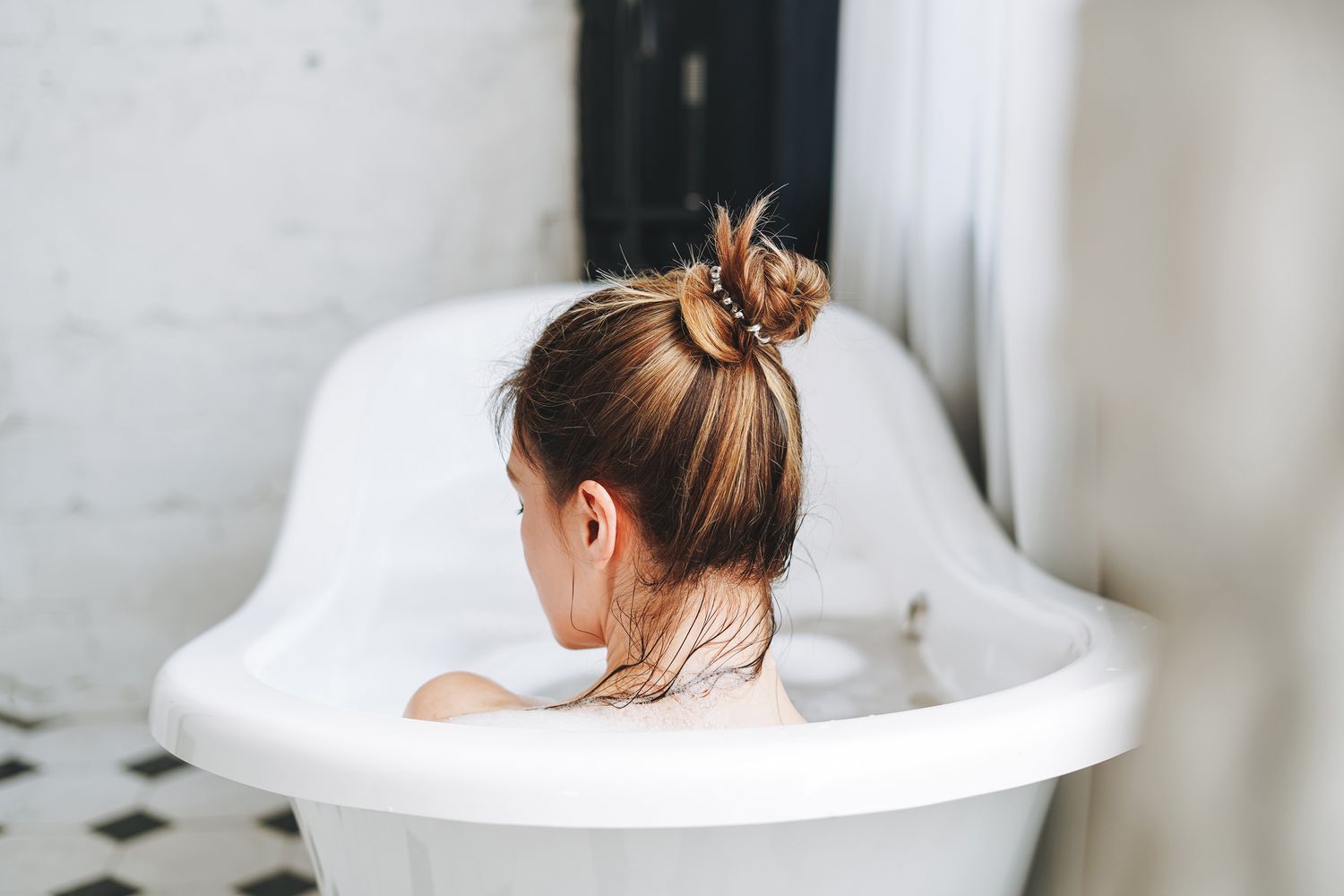 benefits of hot baths realsimple gettyimages 1395495521 43584c62a7514b2db82df4a20329789e
