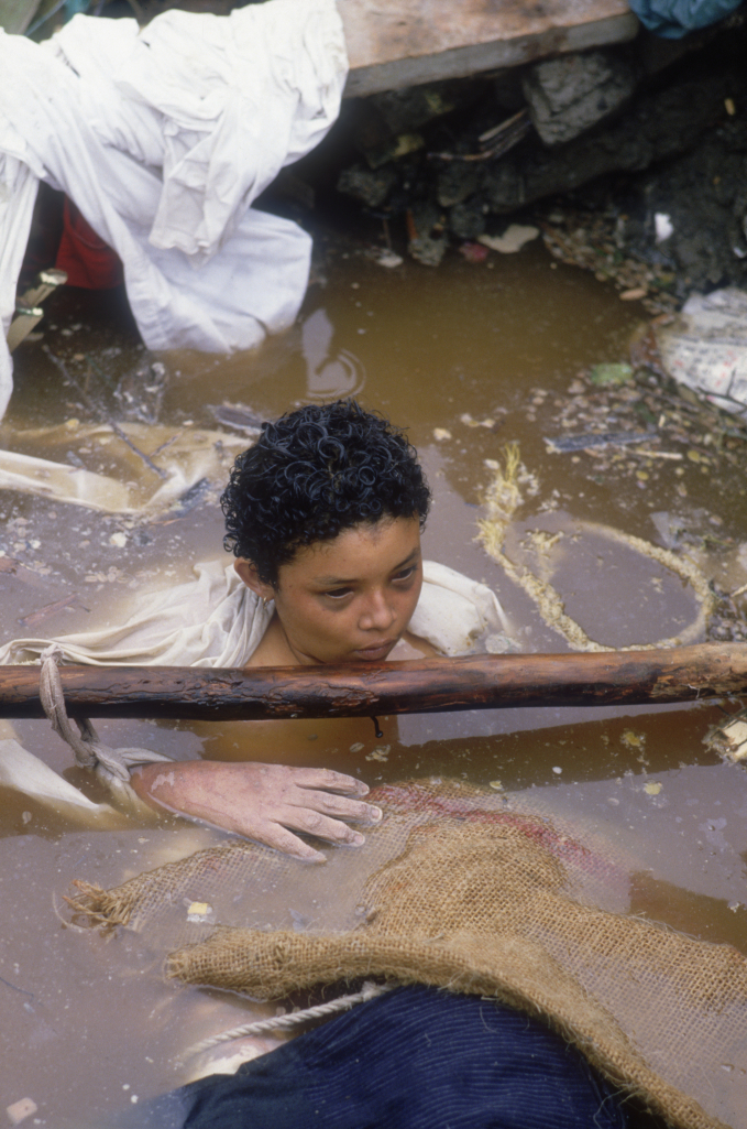 child floats muddy water caught 862178146 083812