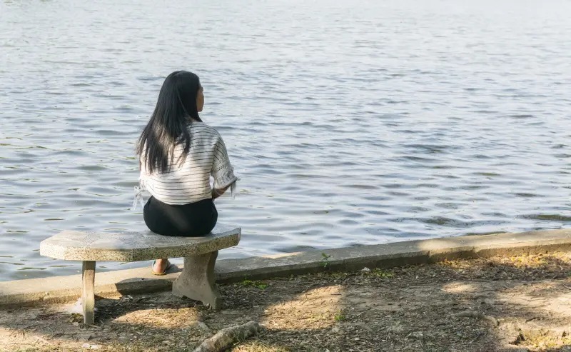 asian woman chair sitting alone river bridge lake background asian woman chair sitting alone river 110516448