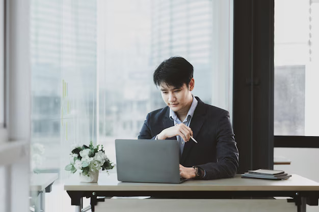 asian man working office his company asian businessman checking laptop private office executive room young startup company executives management concept startup company528263 2753