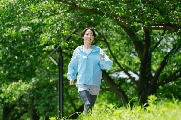 asian middle aged woman exercising 600nw 2708732237