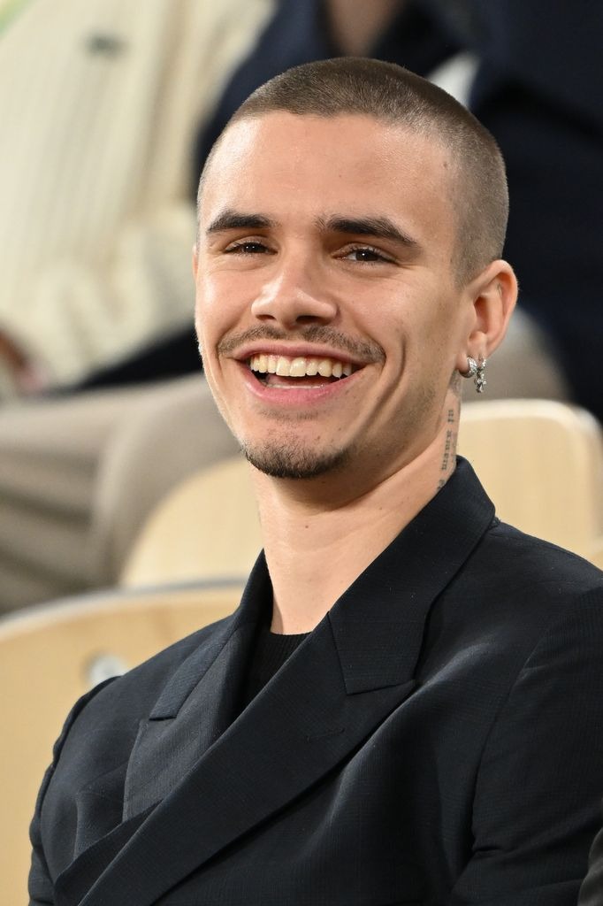 e374f8edf725 romeo beckham grin