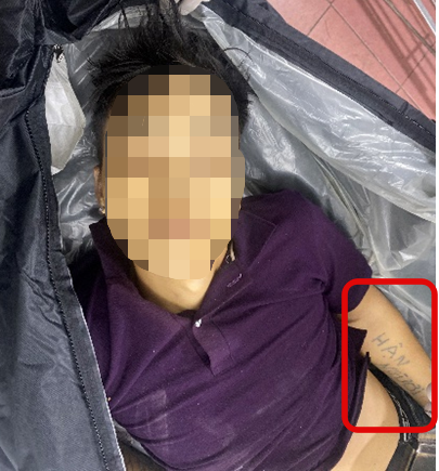 CA Hà Nội tìm tung tích người đàn ông tử vong có xăm chữ HẬN NGƯỜI - Ảnh 1. CA Hà Nội tìm tung tích người đàn ông tử vong có xăm chữ HẬN NGƯỜI - Ảnh 1.