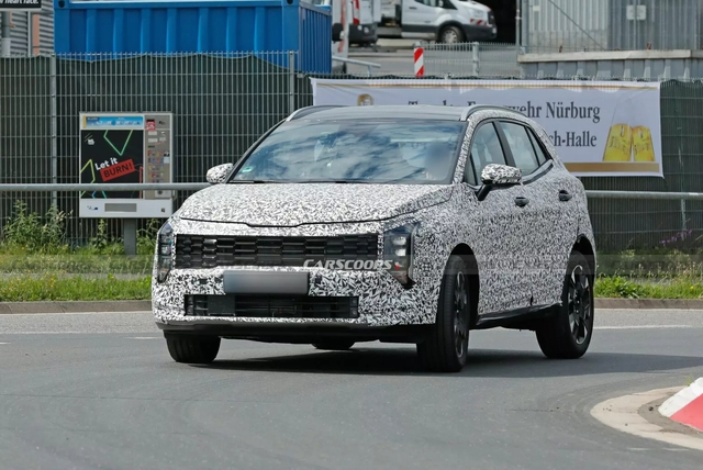 Kia Sportage 2025 lộ thêm nhiều chi tiết: Đèn trước giống Carnival, đèn hậu LED mới, tản nhiệt góc cạnh- Ảnh 2. Kia Sportage 2025 lộ thêm nhiều chi tiết: Đèn trước giống Carnival, đèn hậu LED mới, tản nhiệt góc cạnh- Ảnh 2.