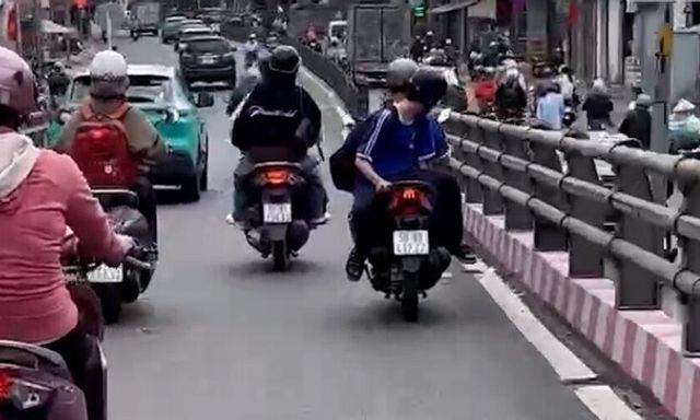 Xác minh clip 2 học sinh chạy xe máy với 