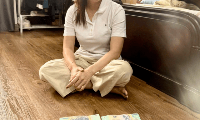 Bắt Lê Thị Thùy Trang, 49 tuổi: Thu giữ hơn 50.000 USD, hơn 2 tỷ đồng tiền mặt cùng hàng chục cuốn sổ đỏ