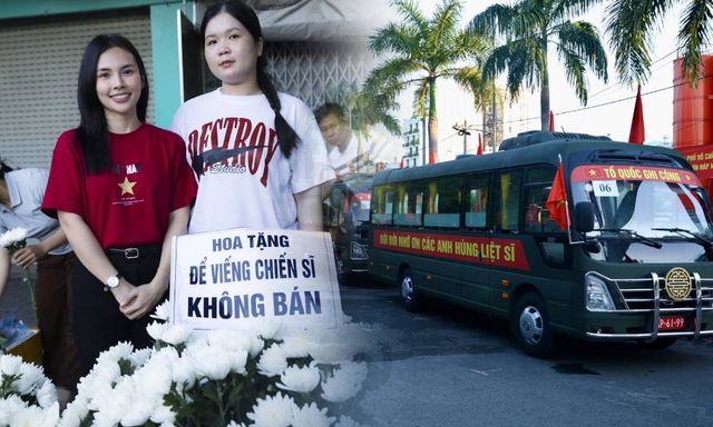 Các bạn trẻ dậy từ 3 giờ sáng, chuẩn bị hoa trắng tặng miễn phí cho người dân đến tiễn đưa 731 liệt sĩ tại Công viên Lê Thị Riêng