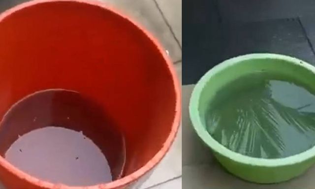 Nước mưa ở Singapore chuyển màu xám đen giữa lúc khói mù bao phủ