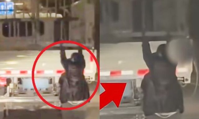 Người phụ nữ đu bám lơ lửng sau xe tải của chồng giữa đêm, cảnh tượng lọt tầm ngắm khiến cảnh sát lập tức lệnh dừng xe