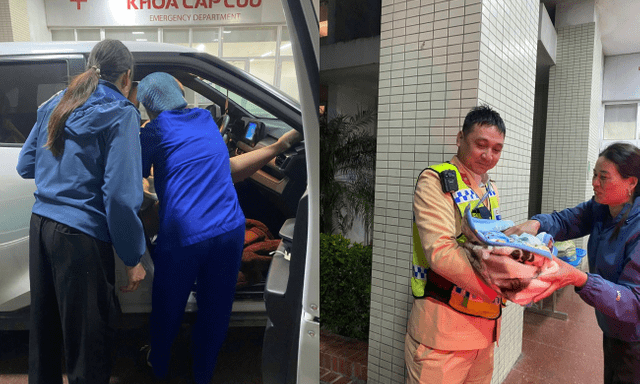 Chồng đỡ đẻ thành công cho vợ trên ô tô với sự hỗ trợ của cán bộ CSGT