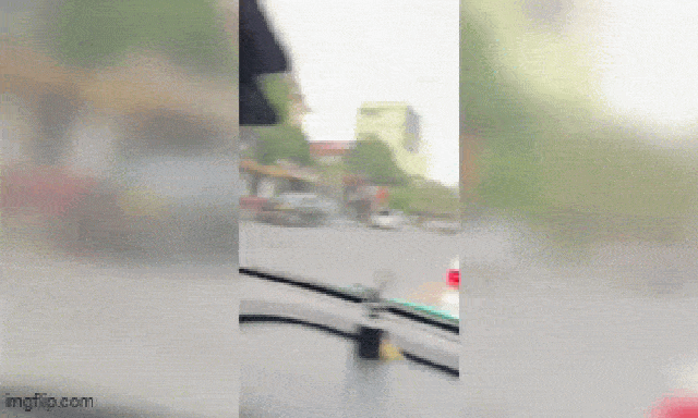 Mặc áo bảo vệ chặn ô tô, cầm hung khí đe dọa 