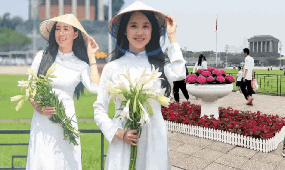 1m2 gặp 10 nàng thơ diện áo dài trắng, tay cầm cờ và hoa: Bình thường sợ “đụng hàng”, giờ thì thấy tự hào 