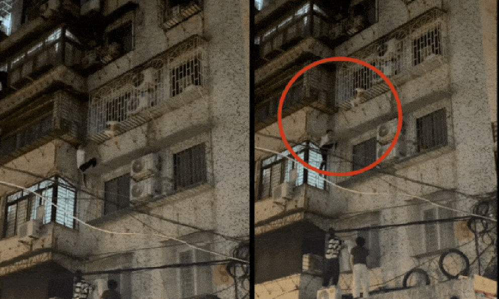 Clip nghẹt thở: Nam thanh niên leo tường chung cư, giải cứu bé trai kẹt đầu treo lơ lửng ngoài “chuồng cọp” tầng 4