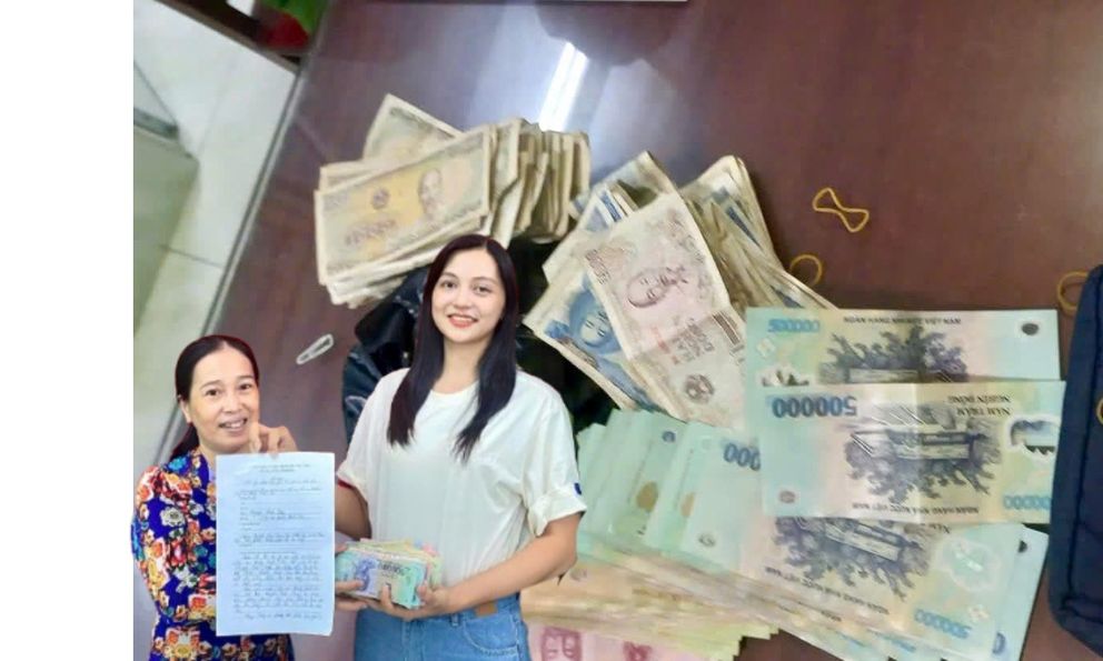 Phát hiện bọc màu đen chứa loạt tờ tiền có mệnh giá từ 1.000 - 500.000 đồng, nữ giáo viên Nguyễn Kiều Oanh lập tức trình báo công an