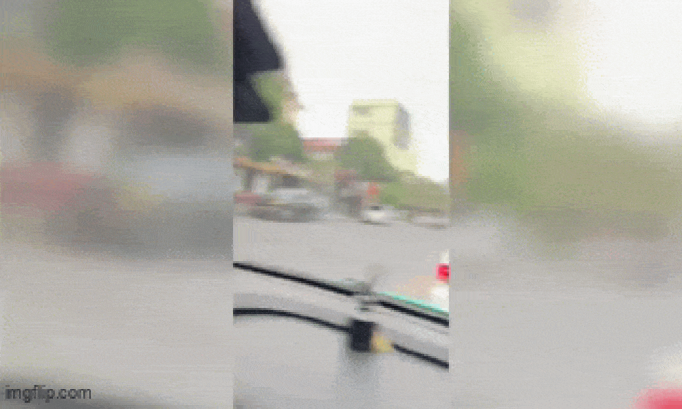 Mặc áo bảo vệ chặn ô tô, cầm hung khí đe dọa 