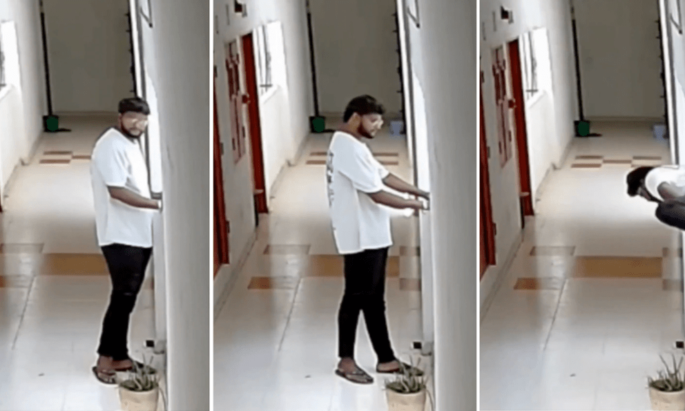 Sau khi giao hàng cho khách, nam nhân viên đi tới chỗ lan can và nhảy xuống từ tầng 13
