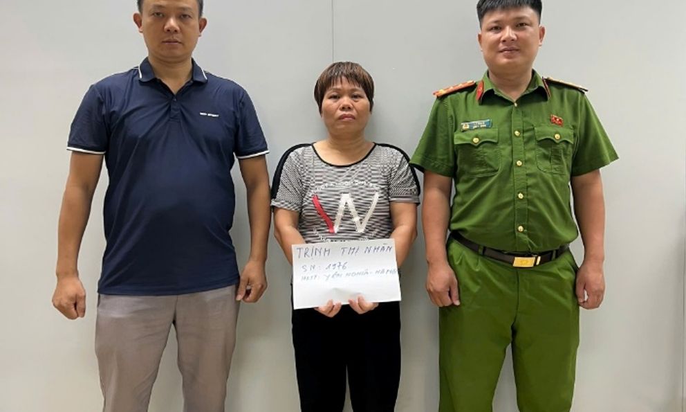 Lê Thị Nhàn 50 tuổi về Việt Nam đầu thú